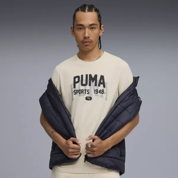  Srajca PUMA GRAPHIC VARSITY TEE 68803587 ALPSKI SNEG 