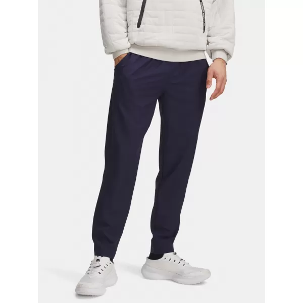  Moške športne hlače UNDER ARMOUR UA UNSTOPPABLE TAPERED PANTS 6003861-410 MODRA 