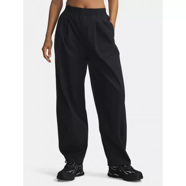  Ženske športne hlače UNDER ARMOUR UA UNSTOPPABLE WVN PLEAT PT 6007027-001 ČRNA 