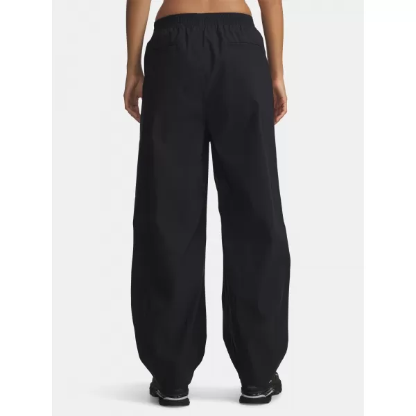  Ženske športne hlače UNDER ARMOUR UA UNSTOPPABLE WVN PLEAT PT 6007027-001 ČRNA 