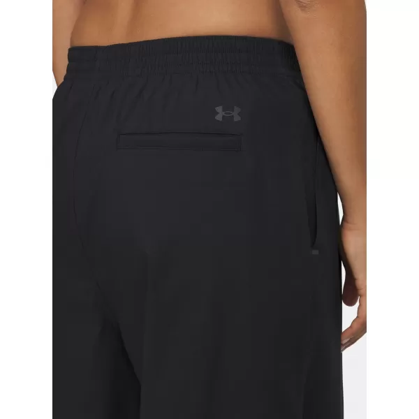  Ženske športne hlače UNDER ARMOUR UA UNSTOPPABLE WVN PLEAT PT 6007027-001 ČRNA 