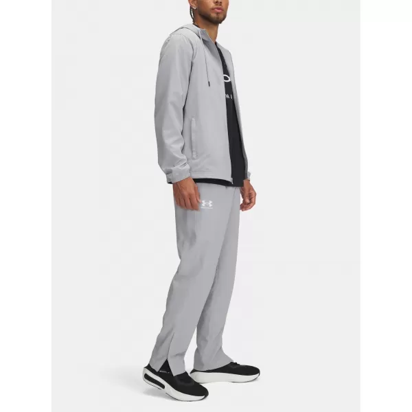  Moške športne hlače UNDER ARMOUR UA RIVAL WVN WINDBREAKER PN 1390150-011 SIVA 