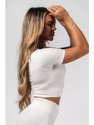 Brezšivni kratki top za oblikovanje FLOW SEAMLESS 499 CREAM Nebbia