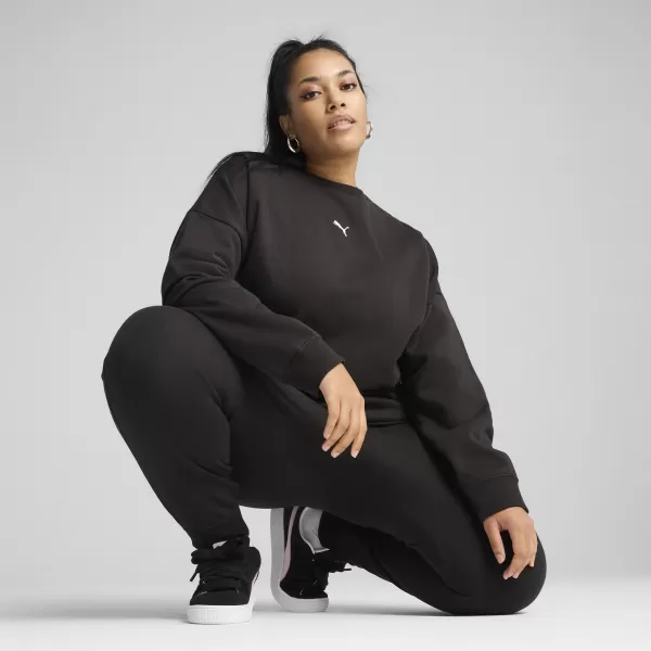  Damske trenirke PUMA ESS OVERSIZED CREW FL 68540001 PUMA ČRNA 