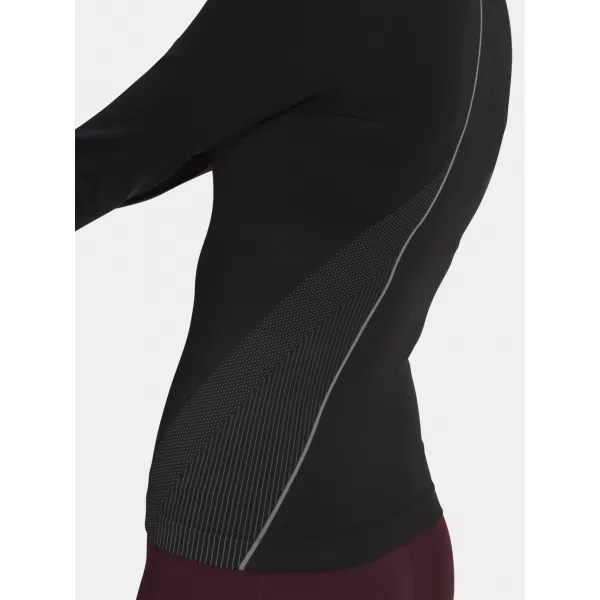  Ženska majica s kratkimi rokavi UNDER ARMOUR UA VANISH SEAMLESS 1/4 ZIP 6000644-003 ČRNA 