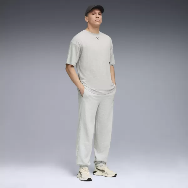  Moške trenirke PUMA M GRAPHIC FRENCH TERRY JOGGER 52770304 SVETLO SIVO VRESJE 