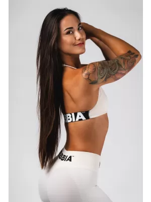 Brezšivni dvižni športni modrček FLOW SEAMLESS 495 CREAM Nebbia