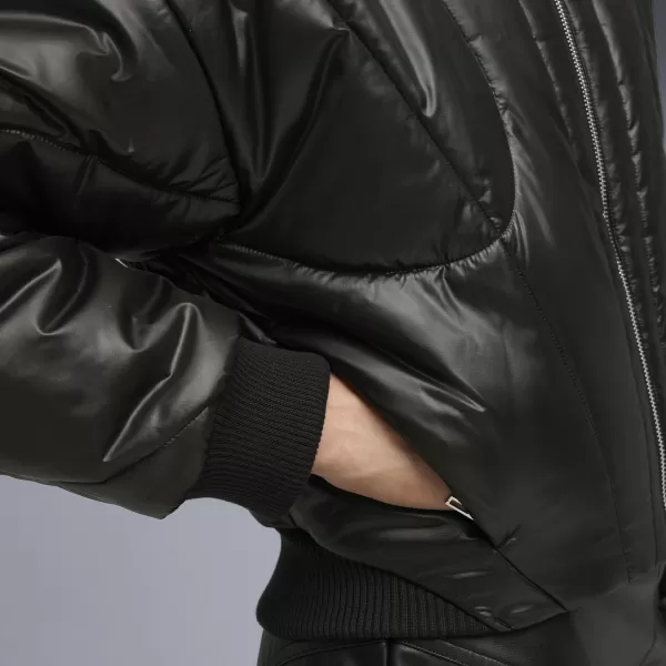  Ženska jakna PUMA DARE TO PUFFER JACKET 63217301 ČRNA PUMA 