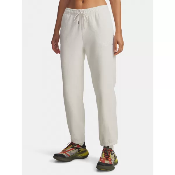  Ženske trenirke UNDER ARMOUR ICON TERRY VARSITY JOGGER 6004858-110 BELA 