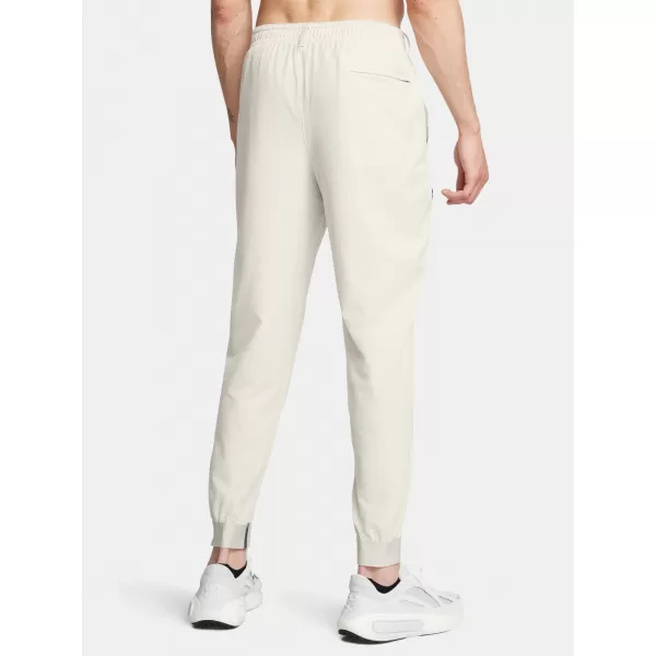  Moške trenirke UNDER ARMOUR UNSTOPPABLE JOGGERS 1388823-110 BELA 