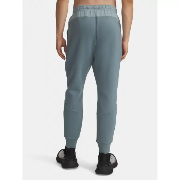  Moške trenirke UNDER ARMOUR UA UNSTOPPABLE FLC JGR EU 1389353-587 MODRA 