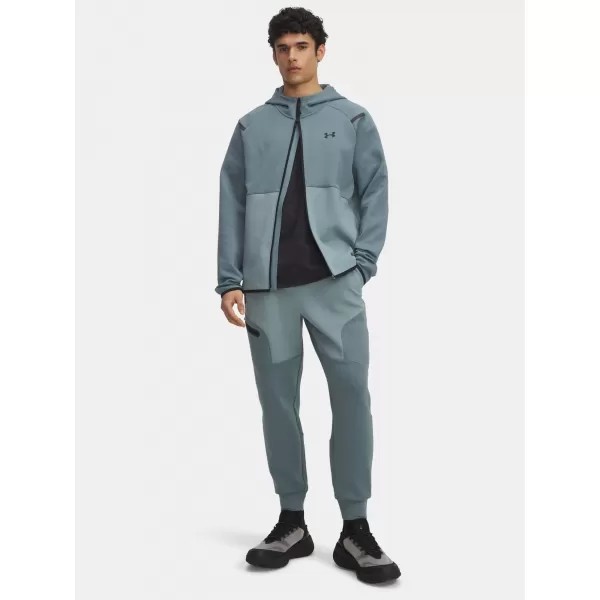  Moške trenirke UNDER ARMOUR UA UNSTOPPABLE FLC JGR EU 1389353-587 MODRA 