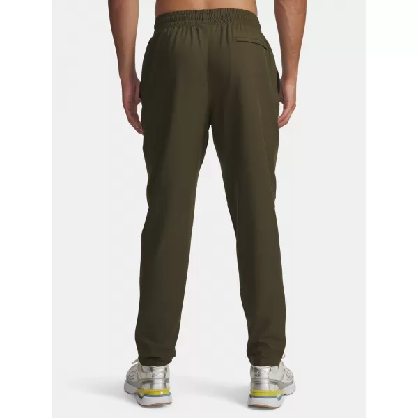 Moške športne hlače UNDER ARMOUR UA UNSTOPPABLE TAPERED PANTS 6003861-308 ZELENA 