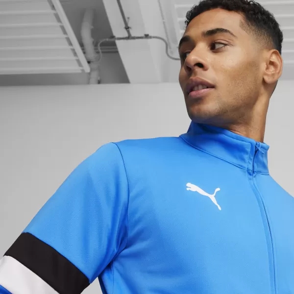  Moški komplet PUMA TEAMRISE TRACKSUIT 658653_02 IGNITE BLUE/ IGNITE BLUE/PUMA BLACK 
