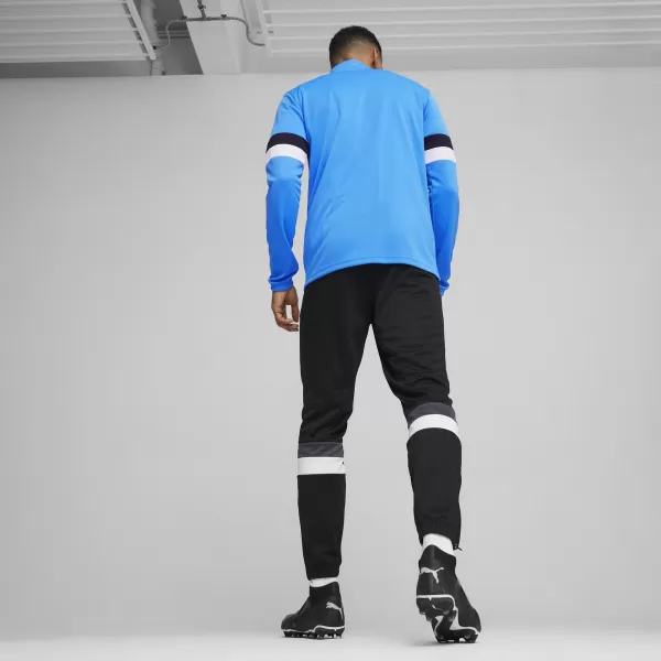  Moški komplet PUMA TEAMRISE TRACKSUIT 658653_02 IGNITE BLUE/ IGNITE BLUE/PUMA BLACK 