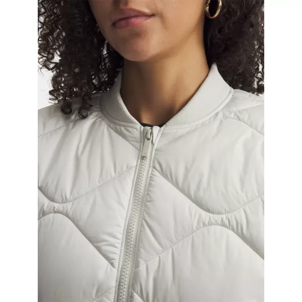  Ženska bomber jakna UNDER ARMOUR HERITAGE BOMBER 6000638-110 BELA 