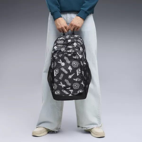 Nahrbtnik PUMA ACADEMY AOP BACKPACK 09115025 PUMA BLACK/RUNNING ICONS AOP 
