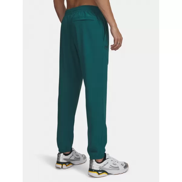  Moške trenirke UNDER ARMOUR VIBE WOVEN JOGGER 1386557-338 ZELENA 