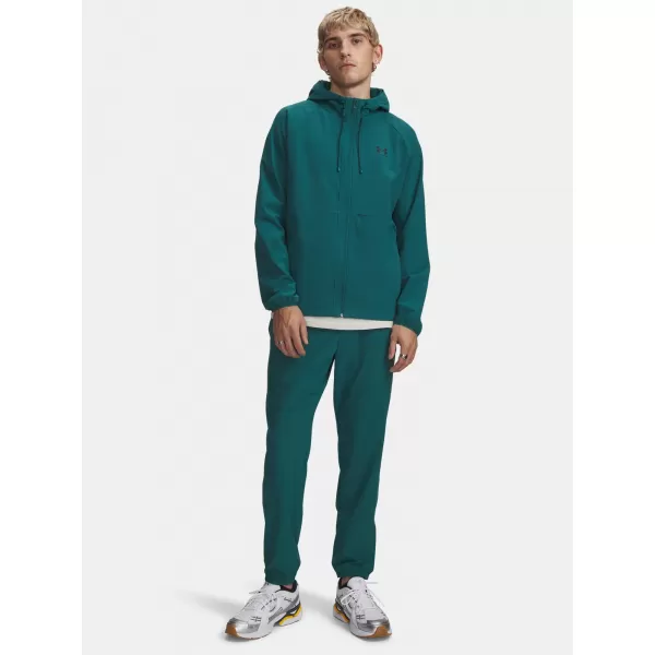  Moške trenirke UNDER ARMOUR VIBE WOVEN JOGGER 1386557-338 ZELENA 