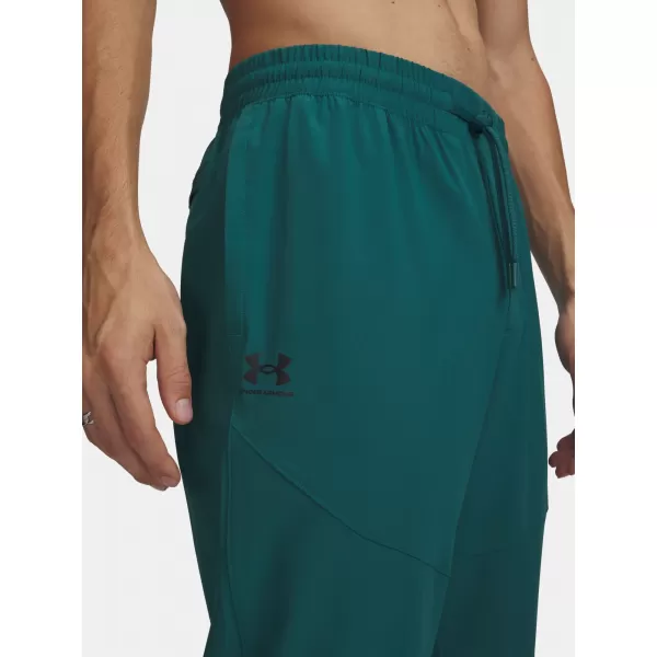  Moške trenirke UNDER ARMOUR VIBE WOVEN JOGGER 1386557-338 ZELENA 
