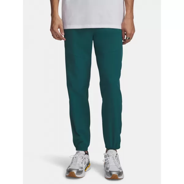  Moške trenirke UNDER ARMOUR VIBE WOVEN JOGGER 1386557-338 ZELENA 