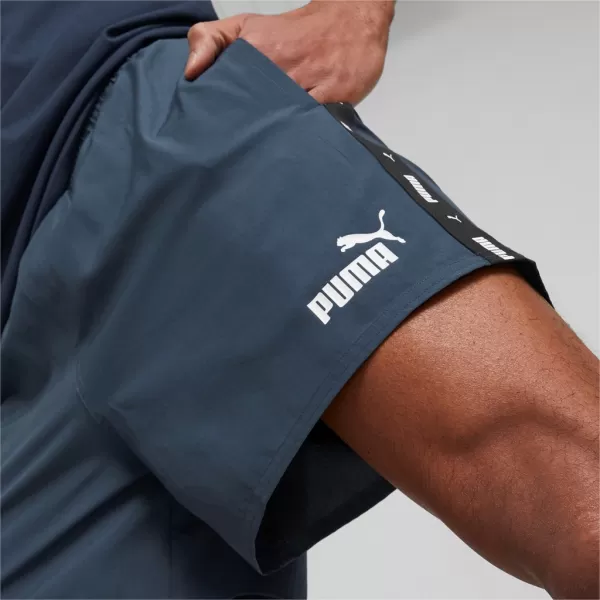  Moške kratke hlače PUMA ESS+ TAPE WOVEN SHORTS 849043-16 MODRA 