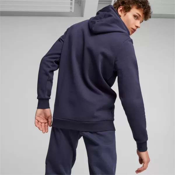  Moški pulover PUMA ESS+ LOGO LAB HOLIDAY HOODIE FL 675924-06 MODRA 
