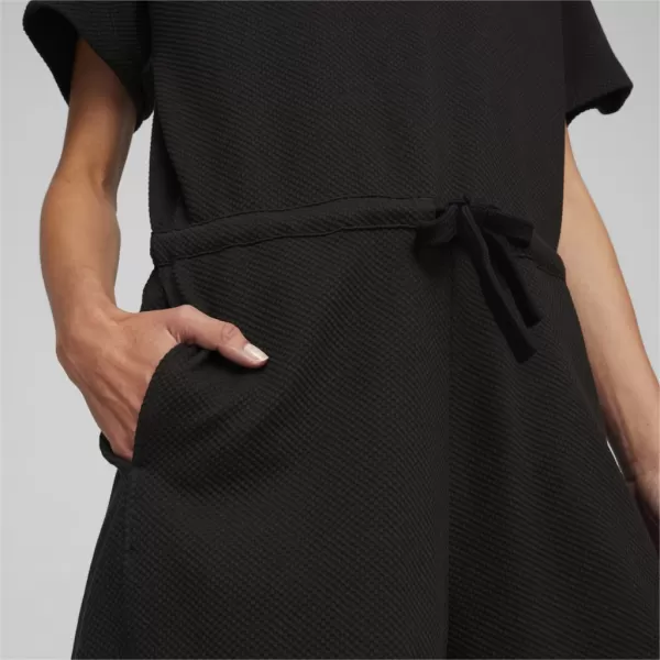  Ženski kombinezon PUMA HER SHORT JUMPSUIT 677891-01 ČRNA 