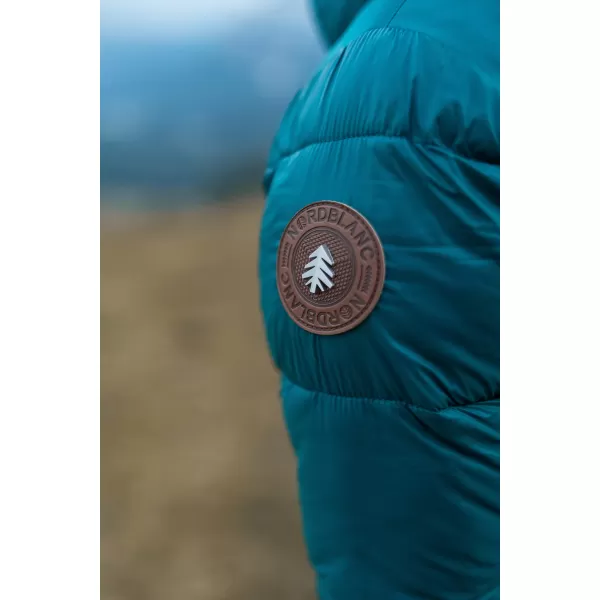  Ženski zimski plašč NORDBLANC WARMHUG NBWJL8073 TEMNO ZELENA 