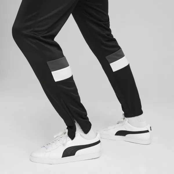  Tralna obleka PUMA TEAMRISE TRACKSUIT 658653_01 PUMA RDEČA/PUMA ČRNA 