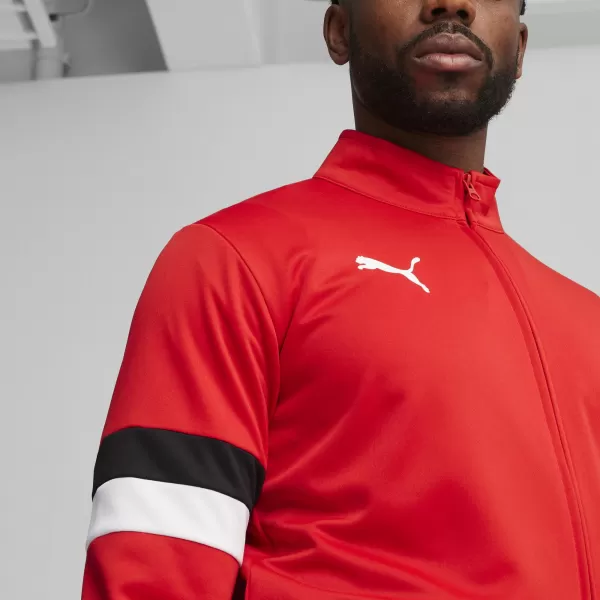  Tralna obleka PUMA TEAMRISE TRACKSUIT 658653_01 PUMA RDEČA/PUMA ČRNA 