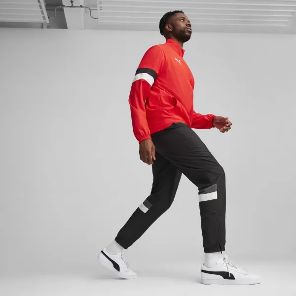  Tralna obleka PUMA TEAMRISE WVN TRACKSUIT 659036_01 PUMA RDEČA 