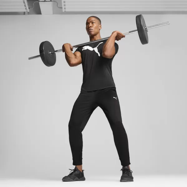  Srajca PUMA M TAD ESS SOLID CAT TEE CF 525921_01 PUMA ČRNA 