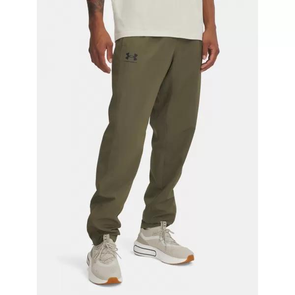  Moške športne hlače UNDER ARMOUR RIVAL WVN WINDBREAKER PN 1390150-390 ZELENA 