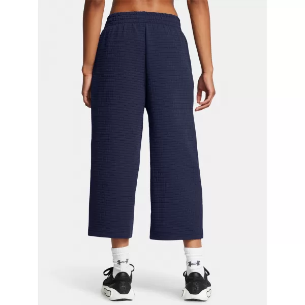  Ženske športne hlače UNDER ARMOUR UNSTOPPABLE FLC GRID CROP 1386492-410 MODRA 