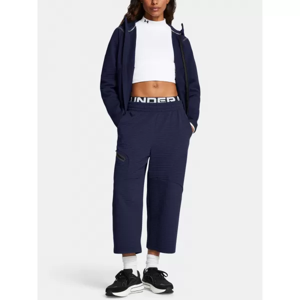  Ženske športne hlače UNDER ARMOUR UNSTOPPABLE FLC GRID CROP 1386492-410 MODRA 