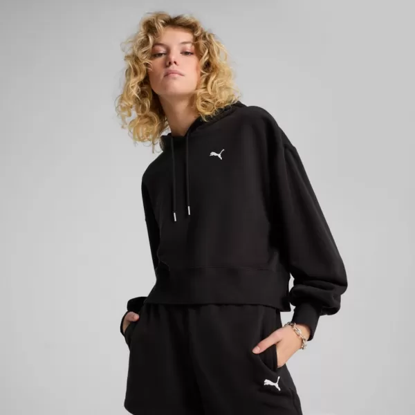  Damske trenirke PUMA WARDROBE ESS RELAXED CROPPED HOODIE TR 629746-01 ČRN 